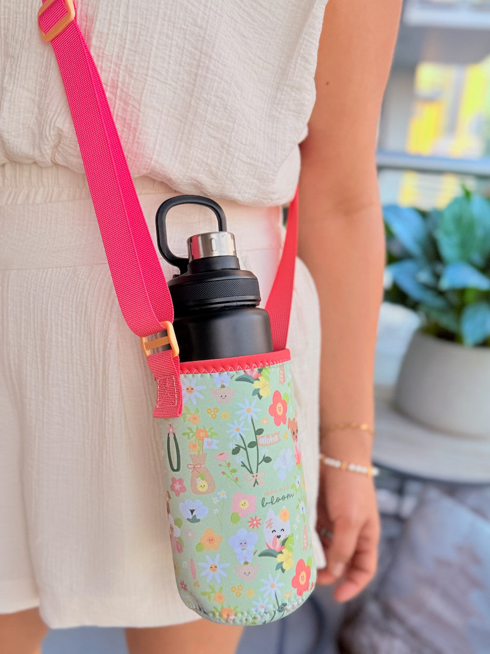 EDEN BOTTLE SLING IN FULL BLOOM GRN