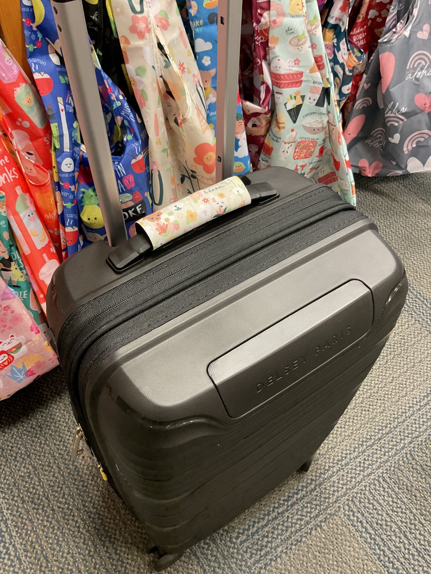 EDEN LUGGAGE WRAP IN FULL BLOOM TAUPE